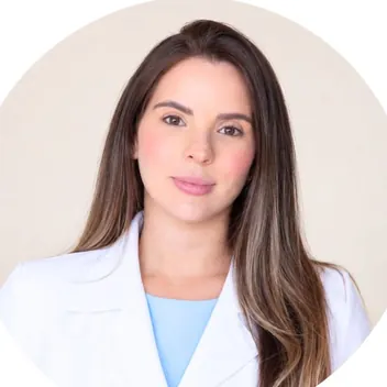 Retrato de Mariana Garcia, de jaleco branco.